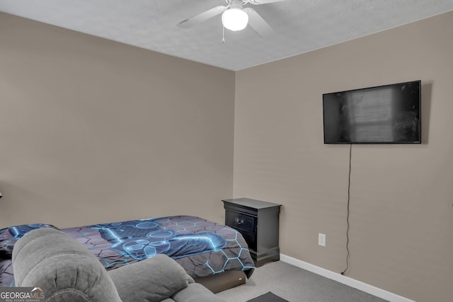 bedroom featuring carpet floors, baseboards, and ceiling fan