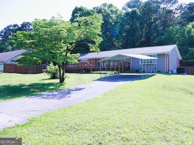 1315 Walston St, Dalton, GA 30720 - view of front of house featuring asphalt driveway and a carport