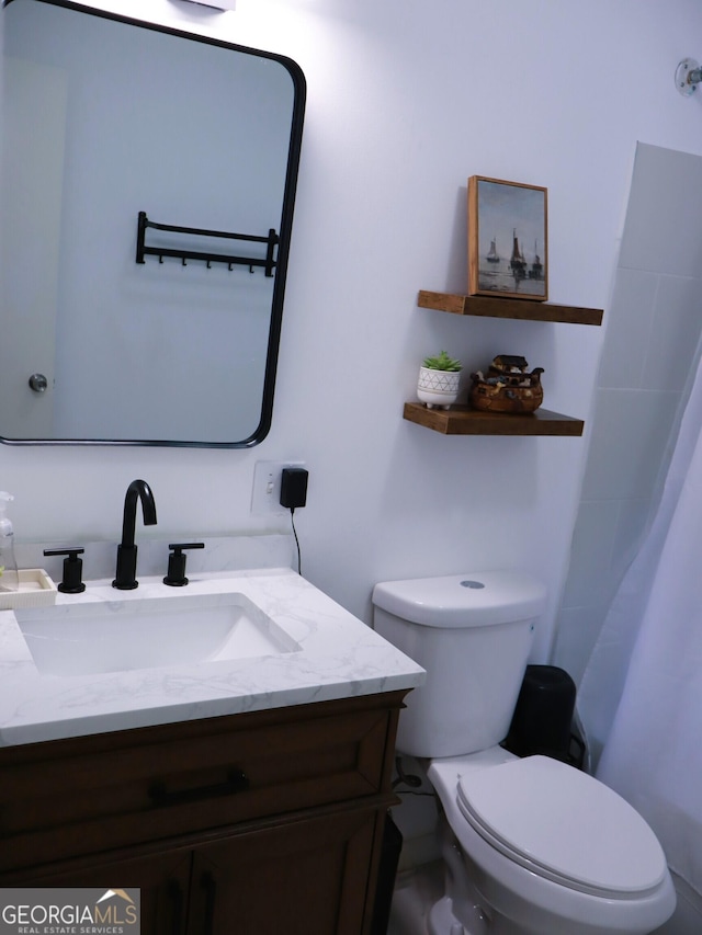 1315 Walston St, Dalton, GA 30720 - bathroom featuring toilet and vanity