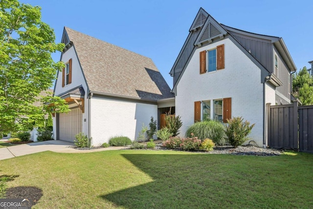 190 Arbor Garden Cir, Newnan, GA 30265 - view of front of home featuring brick siding, driveway, a shingled roof, and a garage