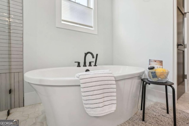 190 Arbor Garden Cir, Newnan, GA 30265 - bathroom with a freestanding tub