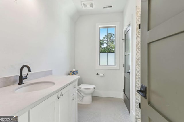 190 Arbor Garden Cir, Newnan, GA 30265 - bathroom featuring toilet, vanity, and baseboards