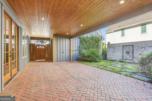 190 Arbor Garden Cir, Newnan, GA 30265 - view of patio / terrace with a gate, french doors, and fence