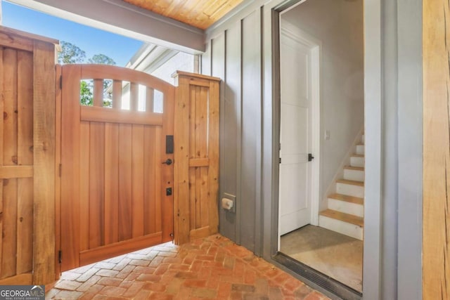 190 Arbor Garden Cir, Newnan, GA 30265 - entryway featuring brick floors and stairs