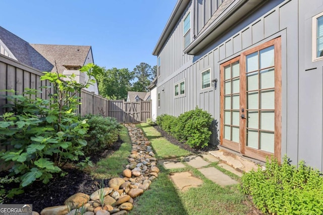 190 Arbor Garden Cir, Newnan, GA 30265 - view of yard featuring fence and french doors