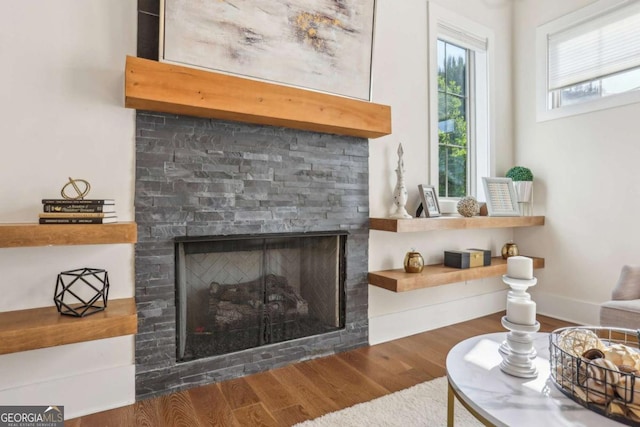 190 Arbor Garden Cir, Newnan, GA 30265 - living room with wood finished floors and a fireplace