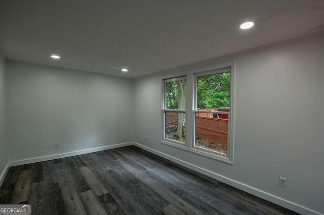 1772 Martin Pl SE, Smyrna, GA 30080 - spare room featuring baseboards, recessed lighting, and dark wood-style floors