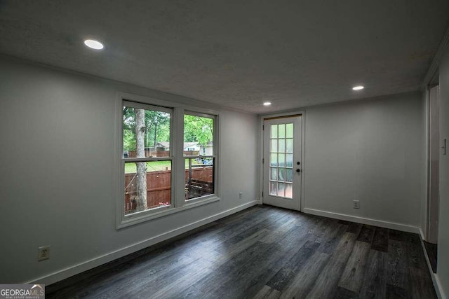 1772 Martin Pl SE, Smyrna, GA 30080 - empty room featuring dark wood-style flooring, baseboards, and recessed lighting