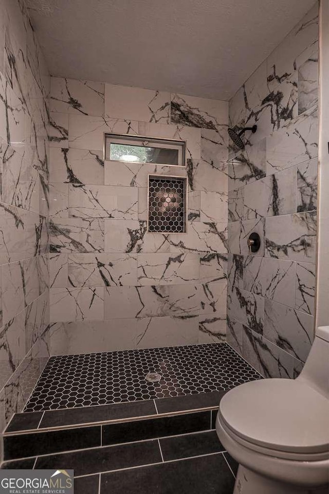 1772 Martin Pl SE, Smyrna, GA 30080 - full bathroom featuring a tile shower and toilet