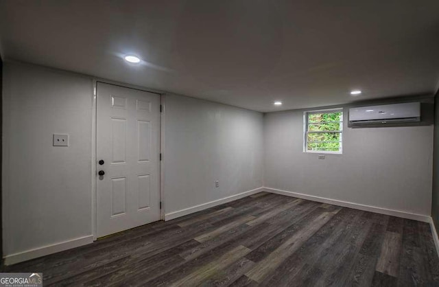 1772 Martin Pl SE, Smyrna, GA 30080 - below grade area with a wall mounted AC, dark wood-type flooring, baseboards, and recessed lighting