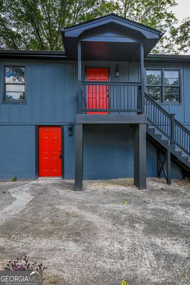 1772 Martin Pl SE, Smyrna, GA 30080 - view of building exterior featuring stairs and an attached garage