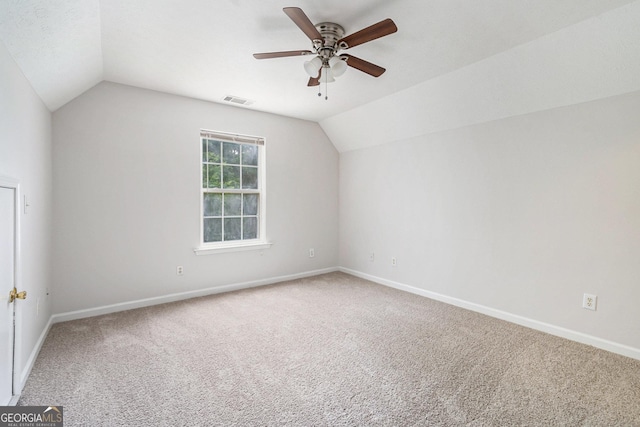 bonus room with carpet flooring, a ceiling fan, lofted ceiling, and baseboards