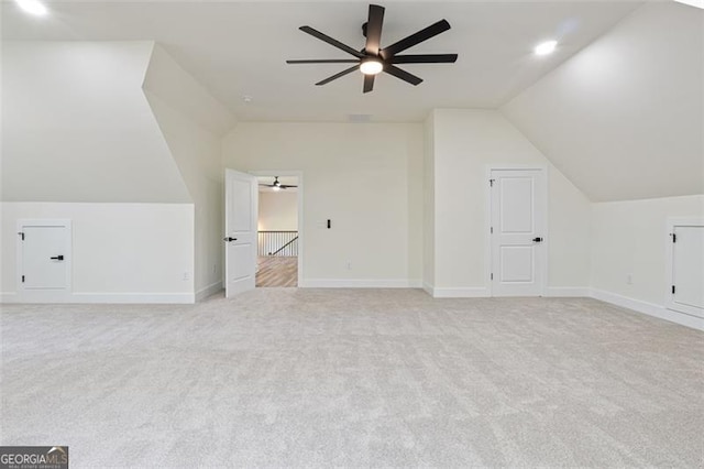 5567 Tyree Rd, Winston, GA 30187 - bonus room with a ceiling fan, vaulted ceiling, light carpet, and baseboards