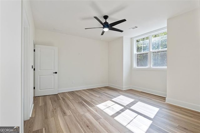 5567 Tyree Rd, Winston, GA 30187 - spare room with light wood-type flooring, baseboards, and ceiling fan