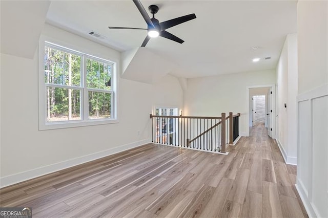 5567 Tyree Rd, Winston, GA 30187 - unfurnished room with light wood-style flooring, a ceiling fan, and baseboards