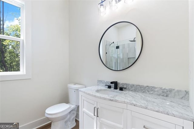 5567 Tyree Rd, Winston, GA 30187 - bathroom with vanity, toilet, a shower, and baseboards