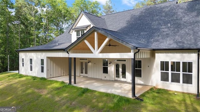 5567 Tyree Rd, Winston, GA 30187 - back of property with french doors, a yard, board and batten siding, and a shingled roof