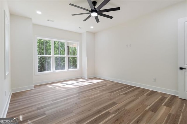 5567 Tyree Rd, Winston, GA 30187 - unfurnished room featuring wood finished floors, a ceiling fan, baseboards, and recessed lighting