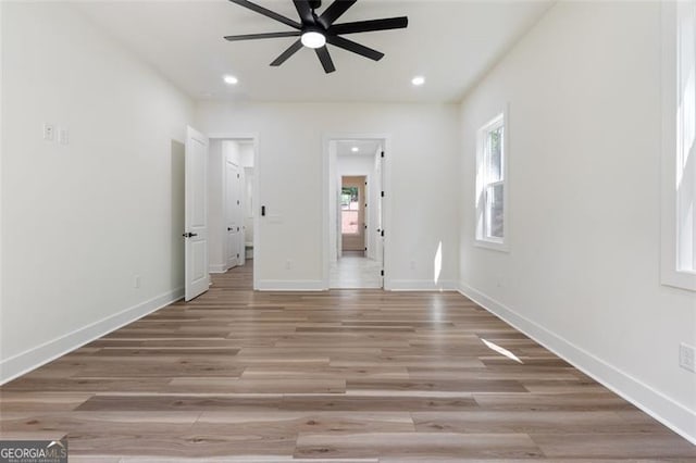 5567 Tyree Rd, Winston, GA 30187 - spare room featuring a ceiling fan, light wood-style flooring, recessed lighting, and baseboards