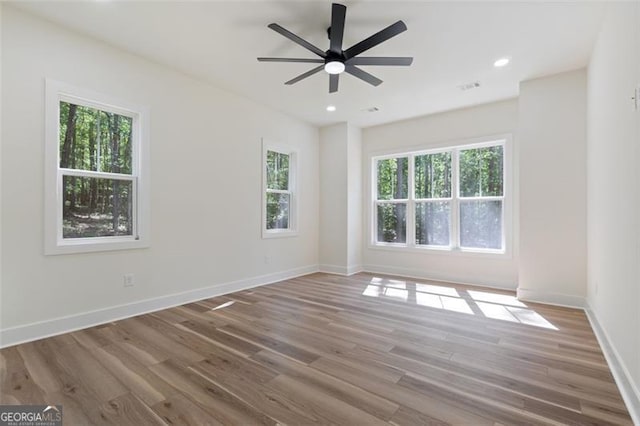 5567 Tyree Rd, Winston, GA 30187 - unfurnished room featuring wood finished floors, a ceiling fan, baseboards, and recessed lighting