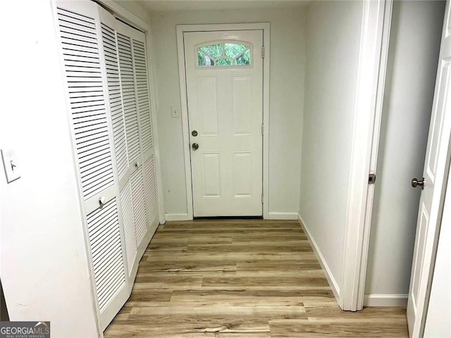 3045 Revere Cir, Snellville, GA 30039 - entryway featuring light wood-type flooring and baseboards