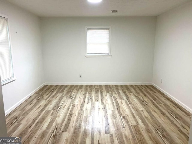 3045 Revere Cir, Snellville, GA 30039 - empty room with wood finished floors and baseboards
