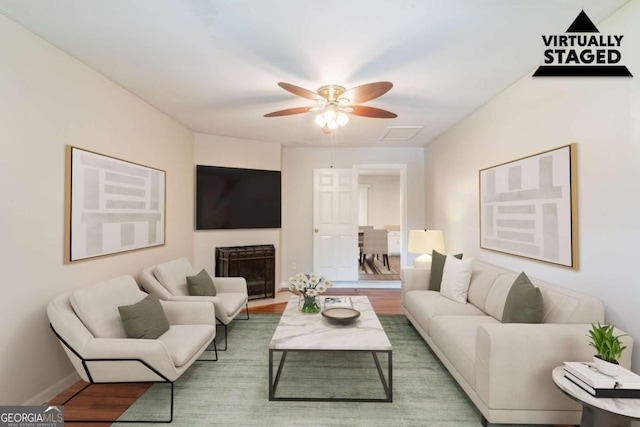 2499 Shiloh Dr, Decatur, GA 30034 - living room with ceiling fan, wood finished floors, and baseboards