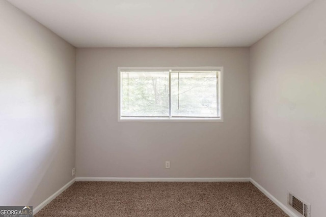 2499 Shiloh Dr, Decatur, GA 30034 - carpeted spare room with baseboards