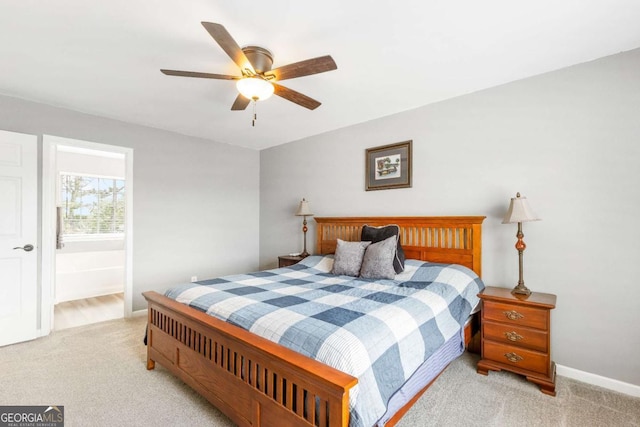 1194 Grandview Cir, Powder Springs, GA 30127 - bedroom with light carpet, baseboards, a ceiling fan, and ensuite bath