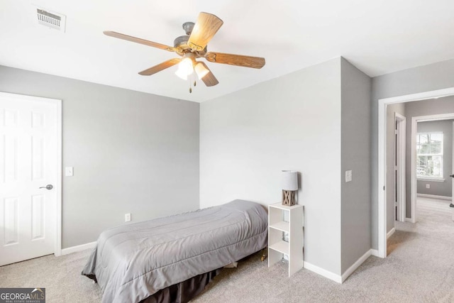 1194 Grandview Cir, Powder Springs, GA 30127 - carpeted bedroom with baseboards and ceiling fan