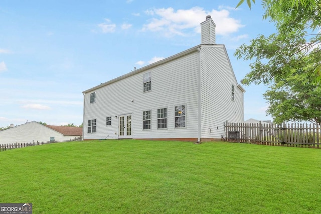 1194 Grandview Cir, Powder Springs, GA 30127 - rear view of house featuring french doors and a chimney
