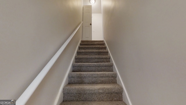 4162 Ward Lake Trl, Ellenwood, GA 30294 - staircase with carpet floors and baseboards