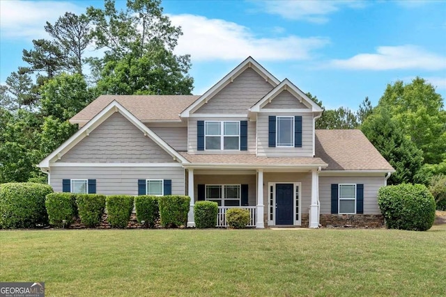 117 Union Ridge Way, Dallas, GA 30132 - craftsman-style home with covered porch, a front yard, and a shingled roof