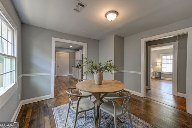 103 Chicamauga Ave SW, Atlanta, GA 30314 - dining space with dark wood-style floors and baseboards