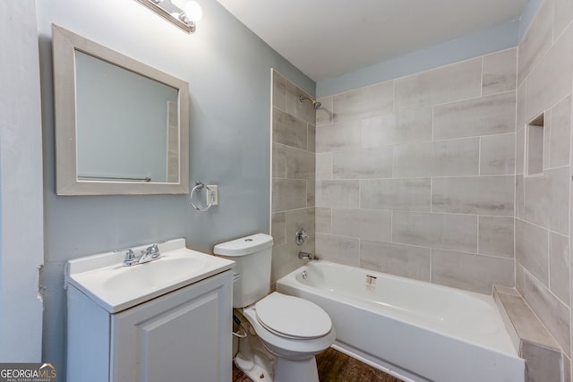 103 Chicamauga Ave SW, Atlanta, GA 30314 - bathroom featuring toilet, vanity, shower / washtub combination, and wood finished floors