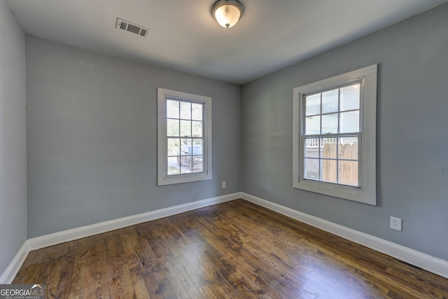 103 Chicamauga Ave SW, Atlanta, GA 30314 - spare room featuring dark wood-style floors and baseboards