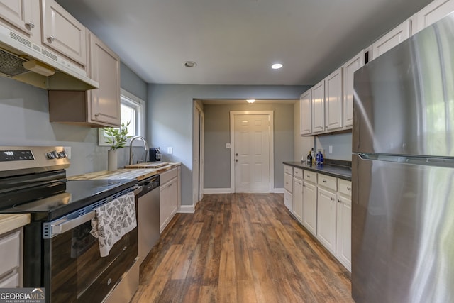 103 Chicamauga Ave SW, Atlanta, GA 30314 - kitchen with stainless steel appliances, a sink, under cabinet range hood, recessed lighting, and dark wood-style flooring
