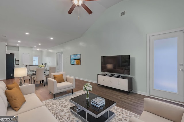 385 Orchard Land, Covington, GA 30014 - living room with a ceiling fan, wood finished floors, baseboards, high vaulted ceiling, and recessed lighting