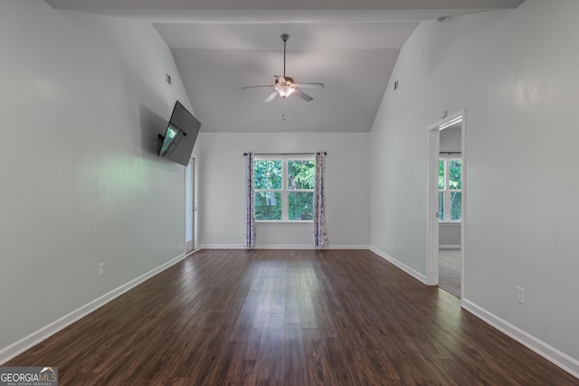 385 Orchard Land, Covington, GA 30014 - unfurnished living room with plenty of natural light, dark wood-style flooring, a ceiling fan, baseboards, and high vaulted ceiling