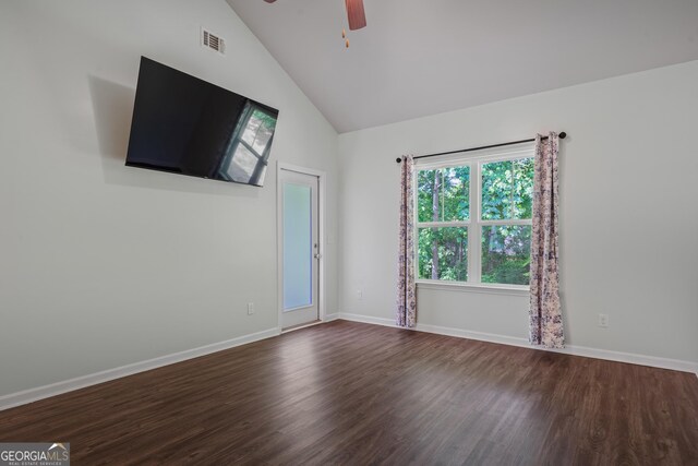 385 Orchard Land, Covington, GA 30014 - spare room with ceiling fan, dark wood-style flooring, lofted ceiling, and baseboards