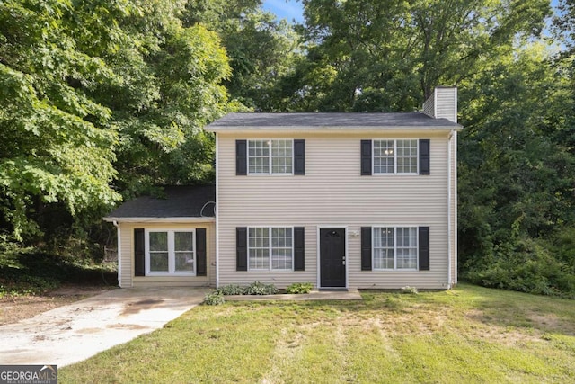430 Pilgrim Ln, Powder Springs, GA 30127 - colonial home with a chimney and a front lawn