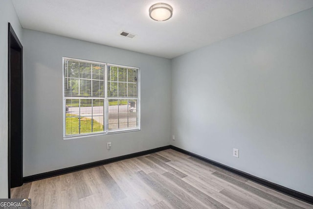 430 Pilgrim Ln, Powder Springs, GA 30127 - unfurnished room with wood finished floors and baseboards