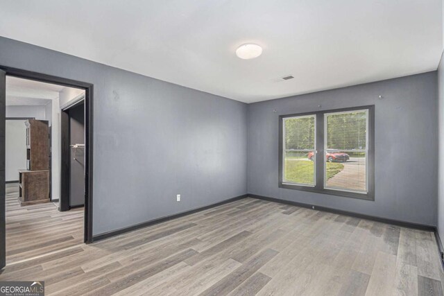 430 Pilgrim Ln, Powder Springs, GA 30127 - empty room featuring light wood-style flooring