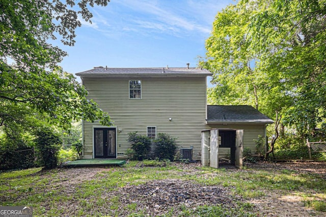 430 Pilgrim Ln, Powder Springs, GA 30127 - rear view of property featuring french doors, fence, and central AC unit