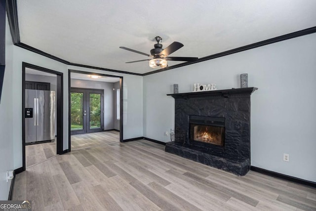 430 Pilgrim Ln, Powder Springs, GA 30127 - unfurnished living room with wood finished floors, ornamental molding, ceiling fan, baseboards, and a premium fireplace