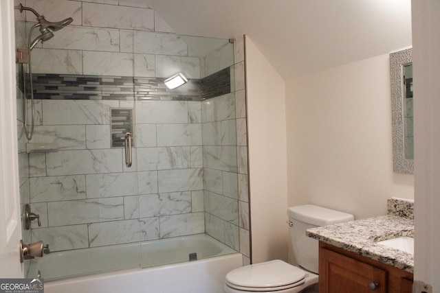full bath with toilet, vanity, and shower / tub combination