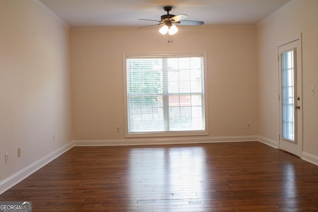 141 Windward Hls, Mcdonough, GA 30253 - spare room featuring ceiling fan, dark wood finished floors, ornamental molding, and baseboards