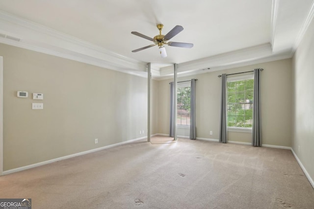 10660 Dunoon Dr, Alpharetta, GA 30022 - spare room with carpet, ornamental molding, ceiling fan, a tray ceiling, and baseboards
