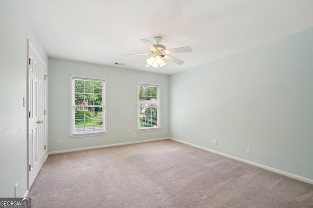 10660 Dunoon Dr, Alpharetta, GA 30022 - carpeted empty room featuring a ceiling fan and baseboards
