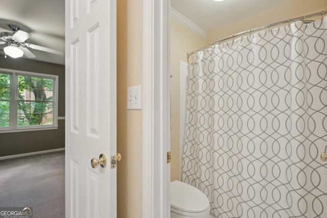 10660 Dunoon Dr, Alpharetta, GA 30022 - full bathroom with ceiling fan, ornamental molding, toilet, and a shower with curtain